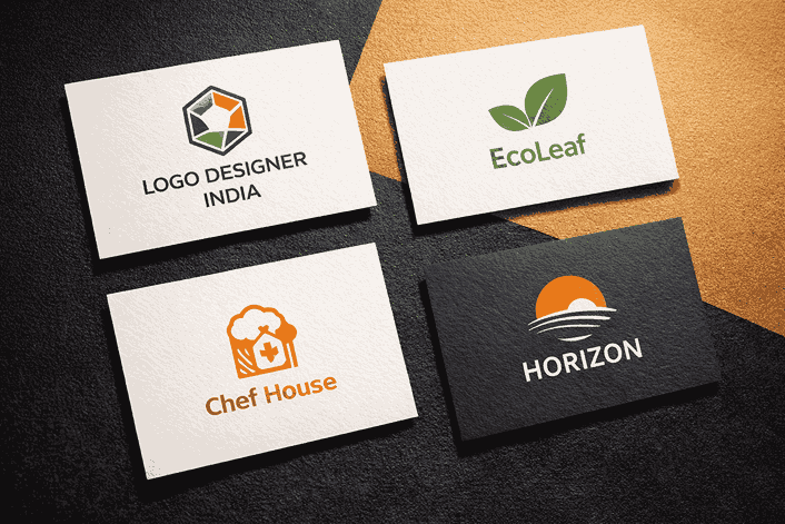 LOGO DESIGNER INDIA showcasing modern logo designs on premium business cards in a professional flat lay