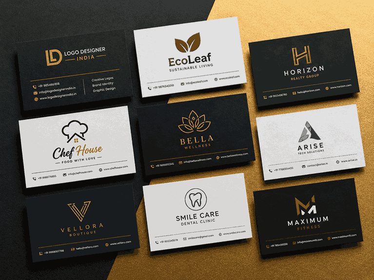 Modern business cards with creative logo designs arranged in a flat lay style on a black and golden textured background